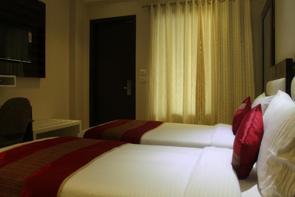 Hotel Gulnar Új-Delhi Szoba fotó