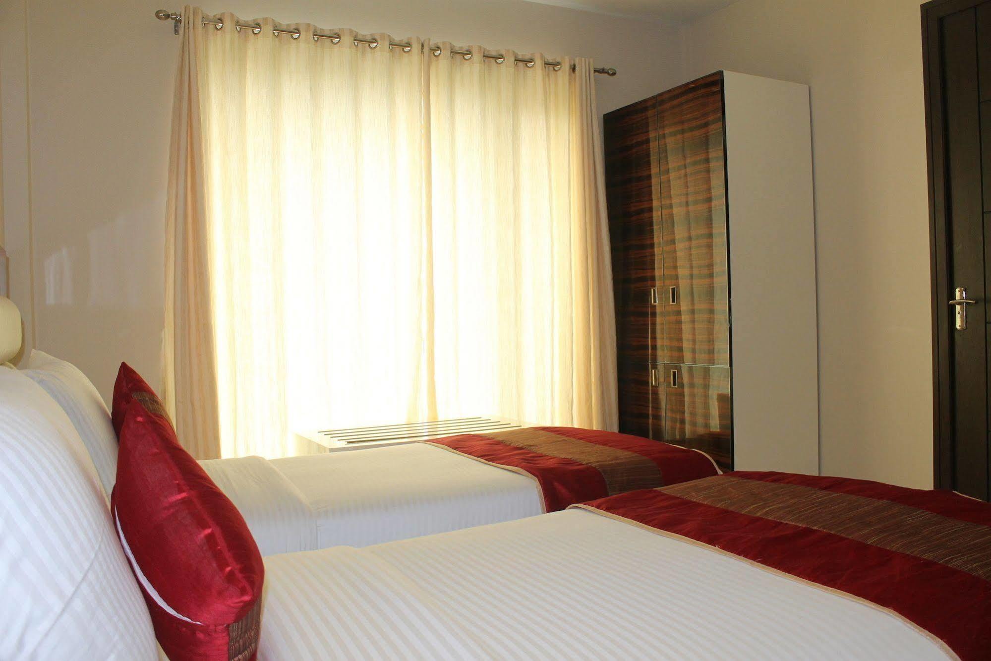 Hotel Gulnar Új-Delhi Szoba fotó